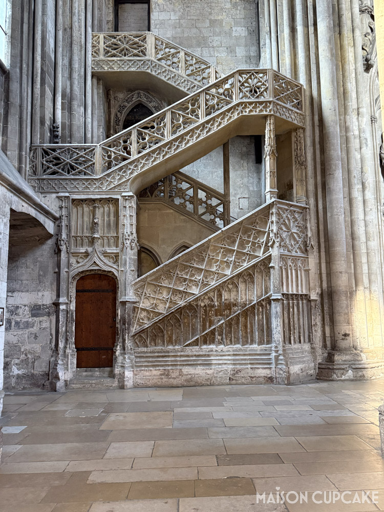 Decorative stone staircase bannisters in Rouen Cathedral.