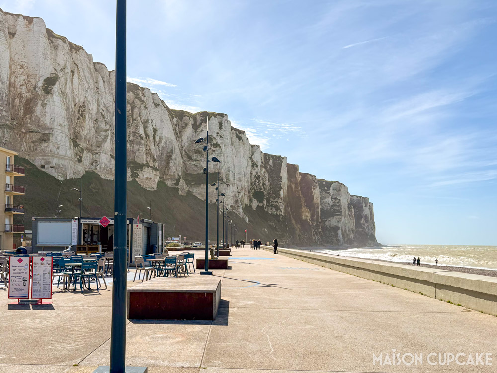 Dramatic cliffs at Le Tréport seen from beach level, northern France on a bright sunny day.