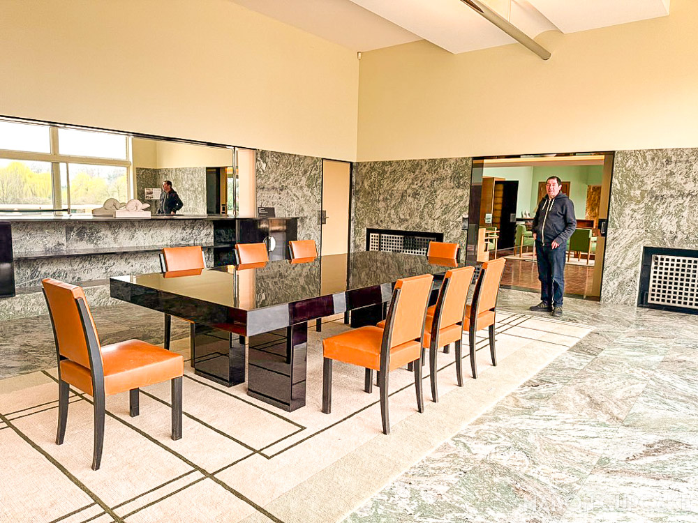 Dining room at Villa Cavrois with long table and modernist interior design