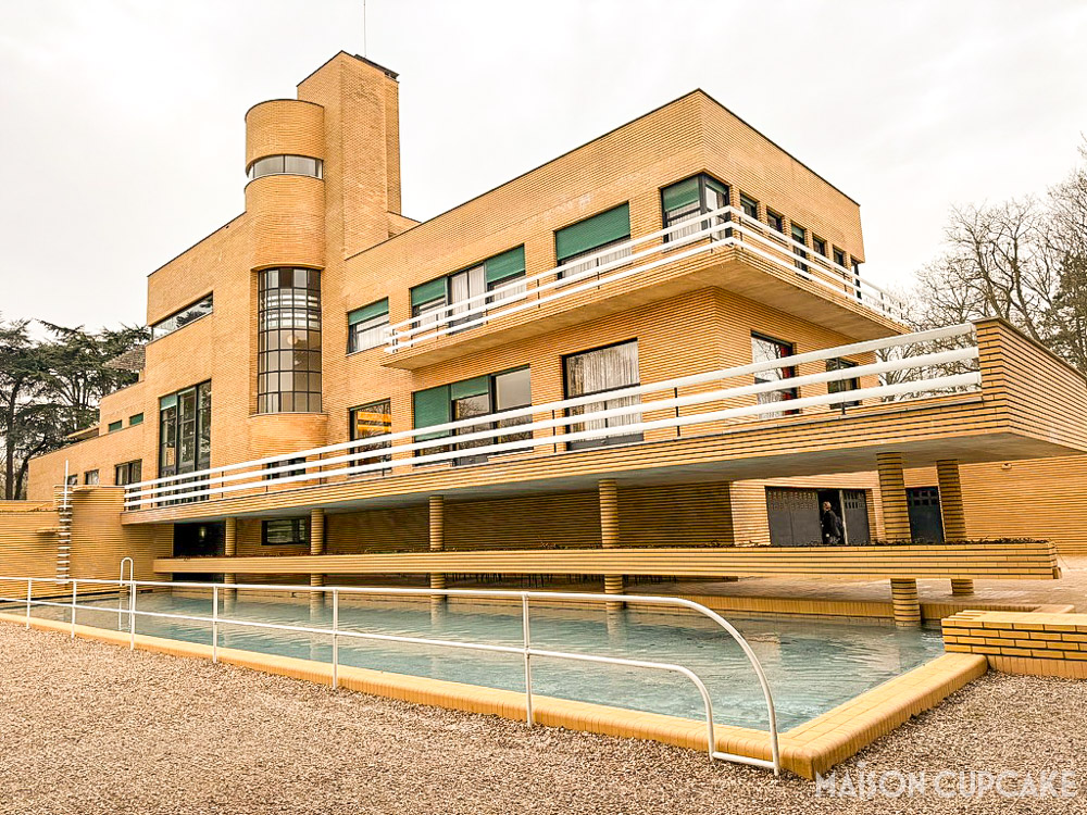 Rear exterior angle of Villa Cavrois Art Deco home with swimming pool and terrace
